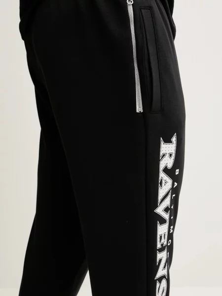 Спортивные штаны Nike с аппликацией черные