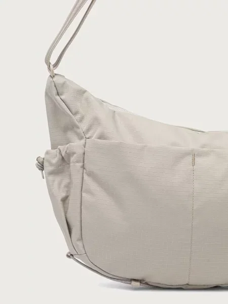 Cotopaxi torebka crossbody Viaje 9L beżowa