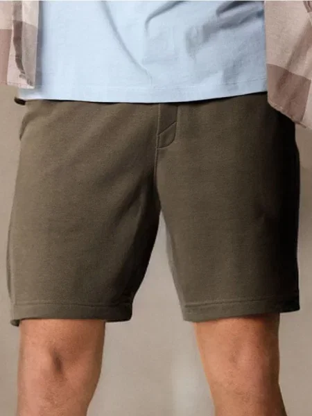 Sinsay Kraťasy s ozdobným vázáním tmavě zelená