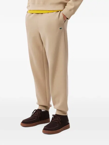 Pantaloni Lacoste alergare cu autograf