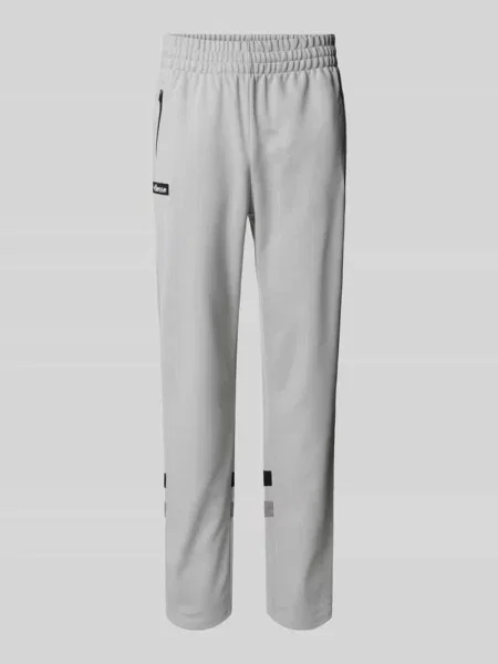 Spodnie typu track pants o kroju regular fit z naszywką z logo model ‘PALMINTERI’ Ellesse