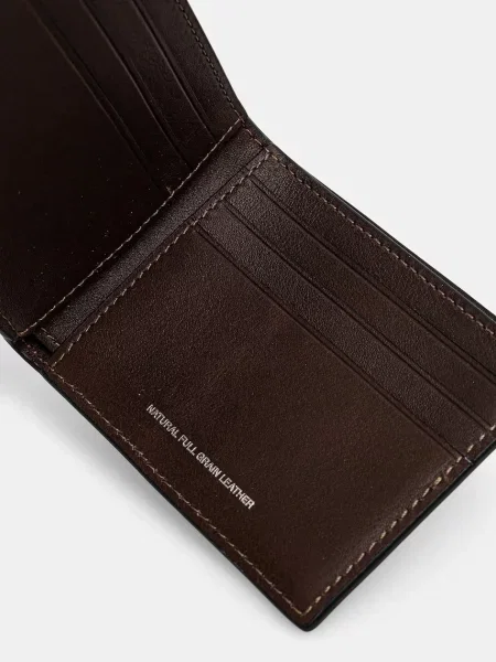 Шкіряний гаманець Coach коричневий