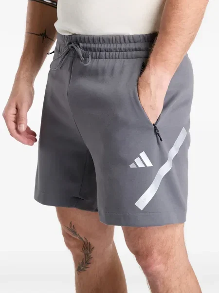 Běžecké pruhované prošívané tričko Adidas oranžové