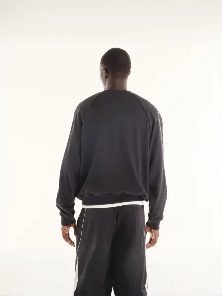Свитер New Balance черный