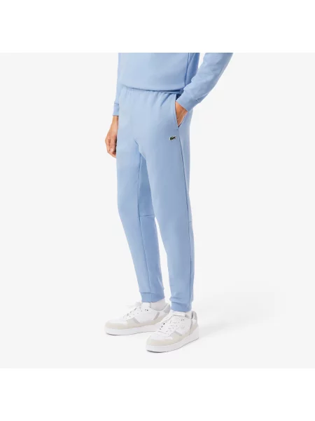 Lacoste Spodnie Dresowe Ze Zwężanymi Nogawkami niebieski
