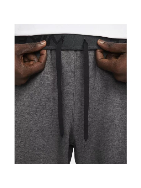 Nohavice Nike sivá