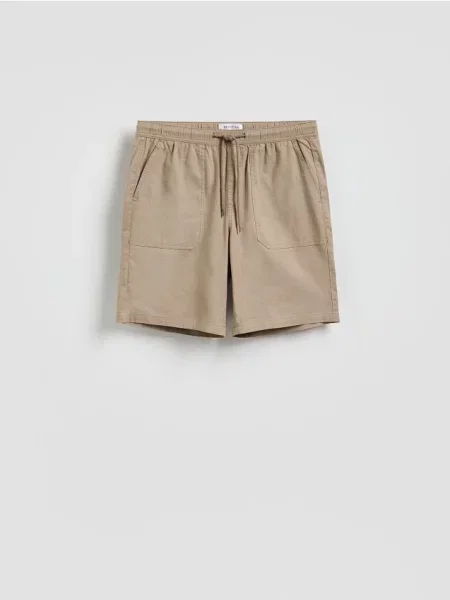 Reserved Pantaloni scurți jogger regular fit bej
