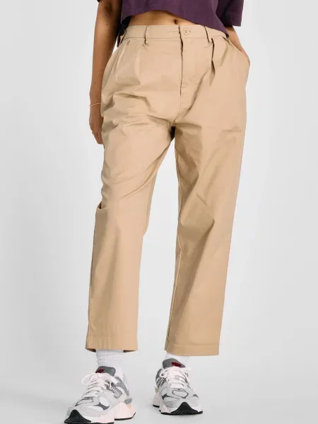 Твілові завужені штани New Balance бежеві