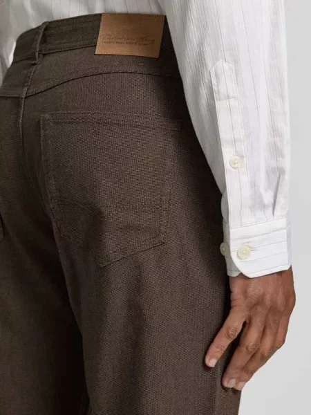 Jeansy o kroju slim fit w 5 kieszeni Christian Berg Men