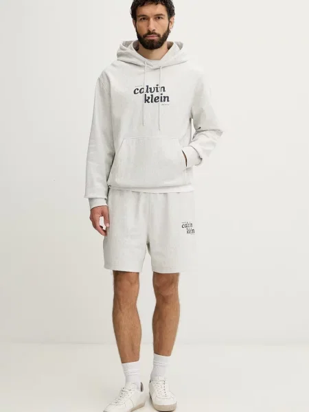 Calvin Klein Jeans pulover s kapuco z bombažem siva