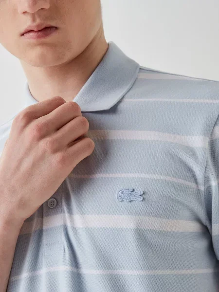 Поло Lacoste голубое