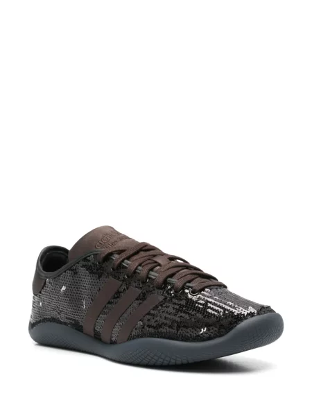 Spodnie Adidas z nadrukiem w panterkę brązowe