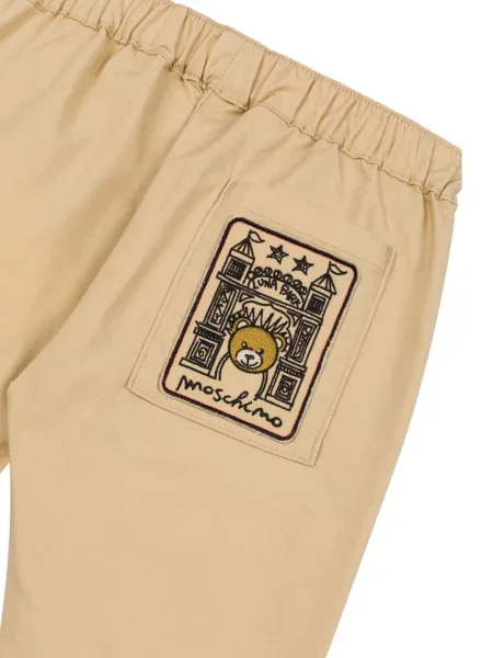 Spodnie dziecięce Moschino brązowe