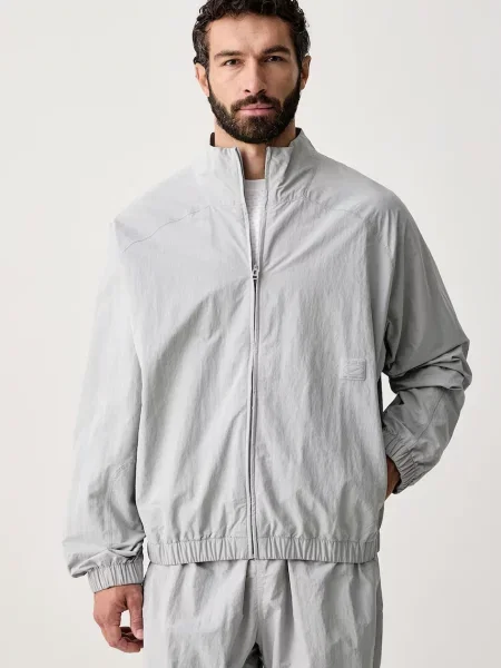 Nike kurtka sportowa N.A.C. Dri-FIT szara