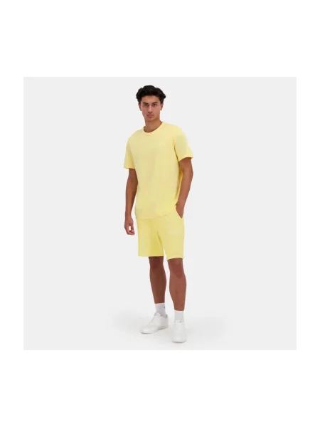 Pantaloni Le Coq Sportif galben