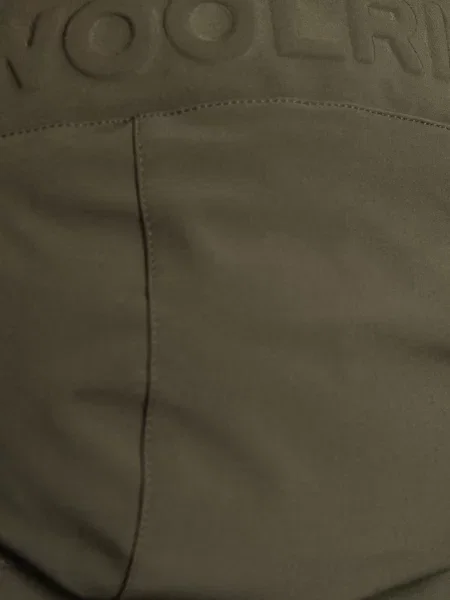 Пуховик Woolrich зеленый