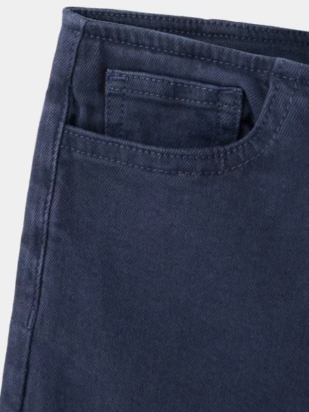 Jeansy flare bez paska w talii Dzieci 12 MANGO KIDS granatowy