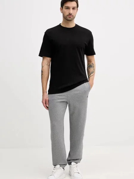 Športové nohavice Calvin Klein sivá