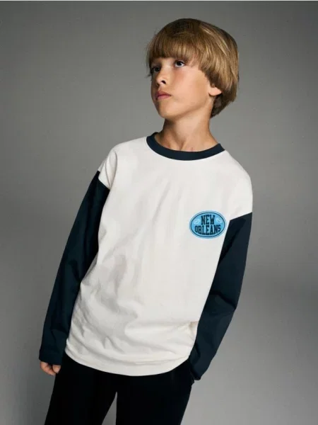Reserved longsleeve złamana biel