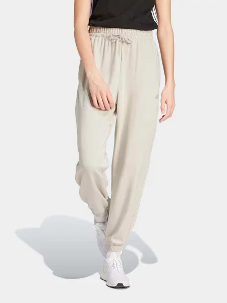 Штани спортивні adidas Essentials Small Logo French Terry Cuffed бавовна/перероблений сірий