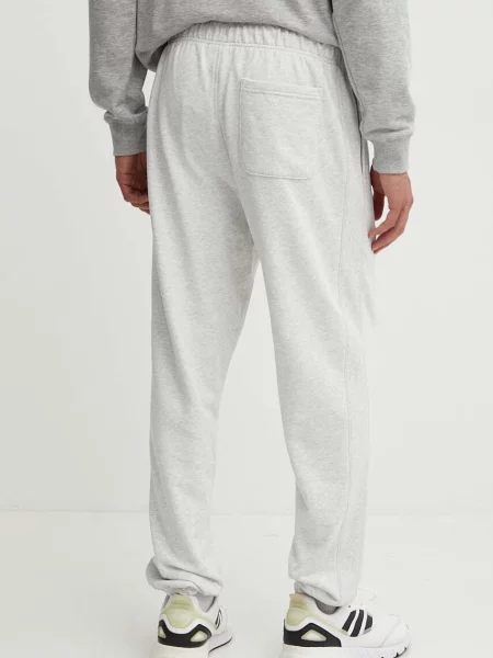 New Balance Spodnie Dresowe Athletics grau szary