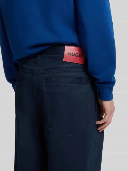 Spodnie o kroju baggy szerokość z czystej bawełny model HUGO niebieskie