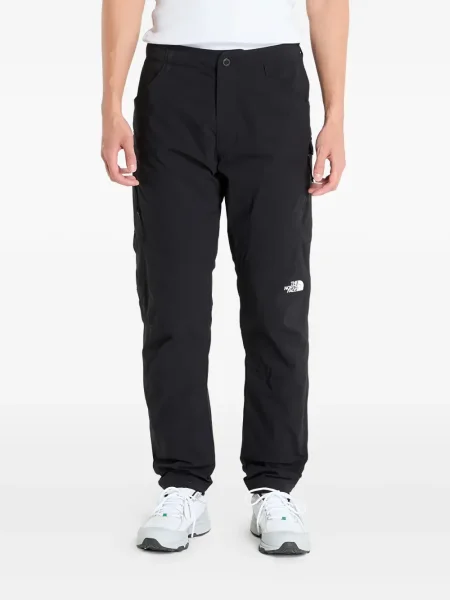 Siaurėjantys kelnės The North Face juoda