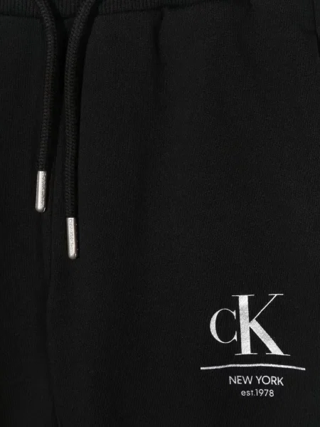Dětské kalhoty Calvin Klein černé