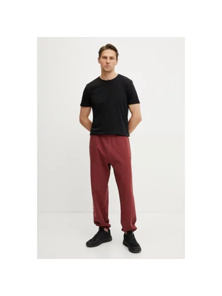 The North Face spodnie dresowe TNF X NSE czerwone