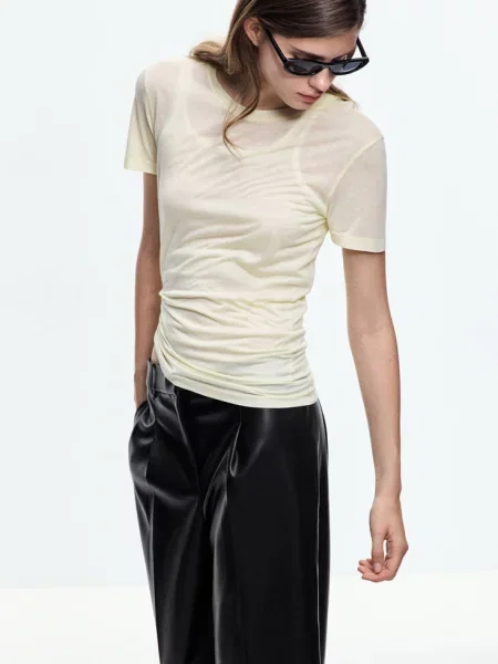 Spodnie wide leg ze sztucznej skóry Kobieta 38 MANGO czarny