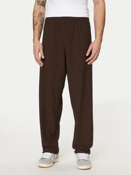 Спортивні штани adidas Originals MONOGRAM TR однотонні коричневий