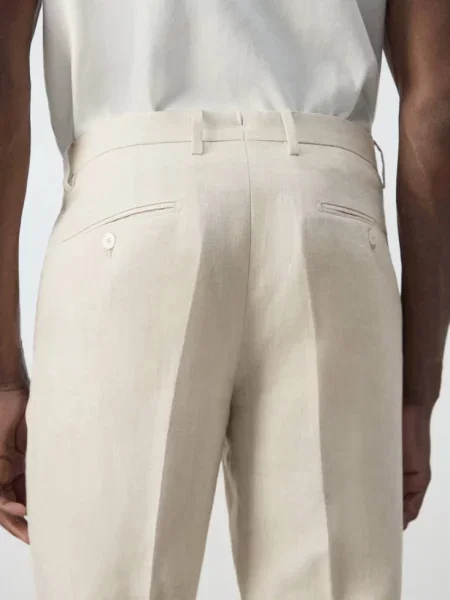 Spodnie garniturowe Amalfi slim fit z lnu kremowy / écru Mężczyzna 42 MANGO MAN
