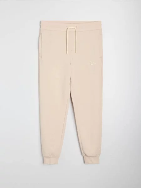Sinsay Kalhoty Jogger slim fit béžová