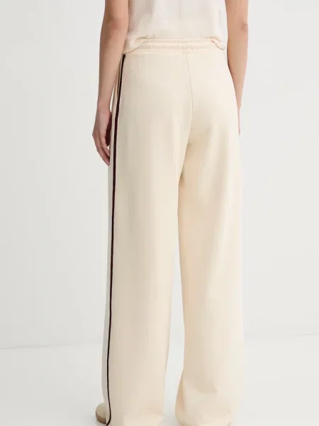 Guess spodnie dresowe JASMINE beżowe