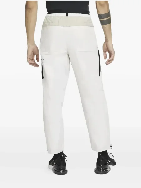 Fleecové běžecké kraťasy Nike s vázáním červené