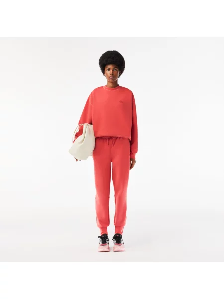 Зауженные спортивные штаны Lacoste розовые