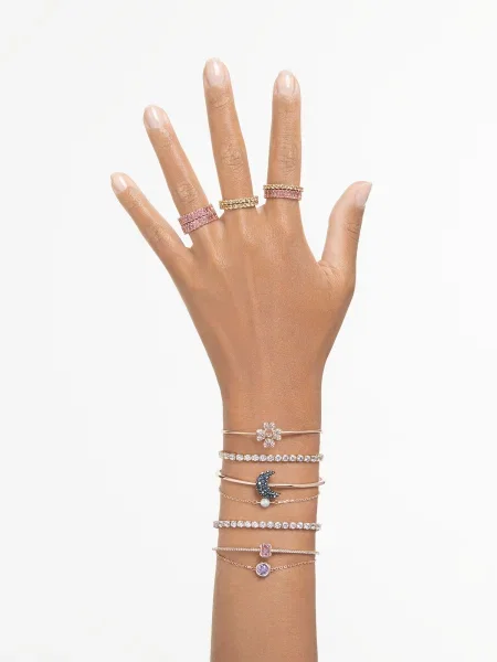 Swarovski Náramok ružové zlato / priehľadná modrá