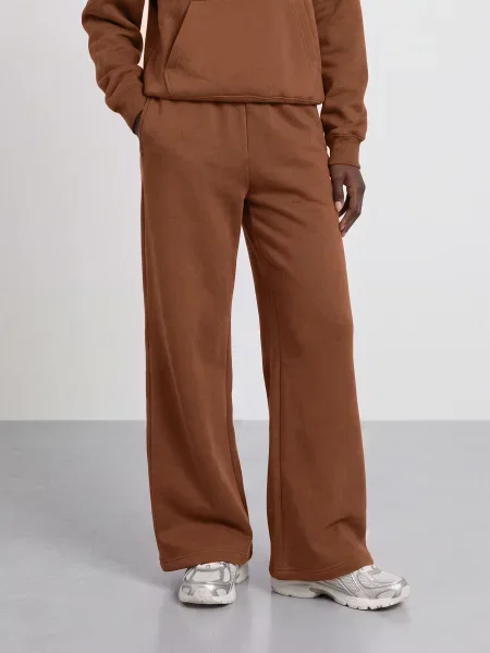 Nike Tepláky hnědá