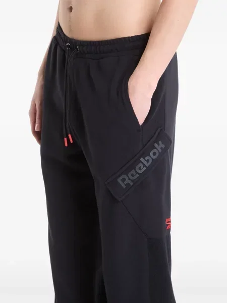 Běžecké kalhoty Reebok s autogramem černé