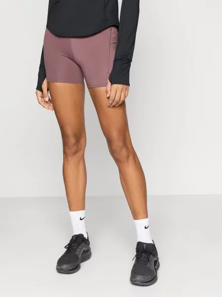 NIKE Sportnadrágok SWIFT csokoládé