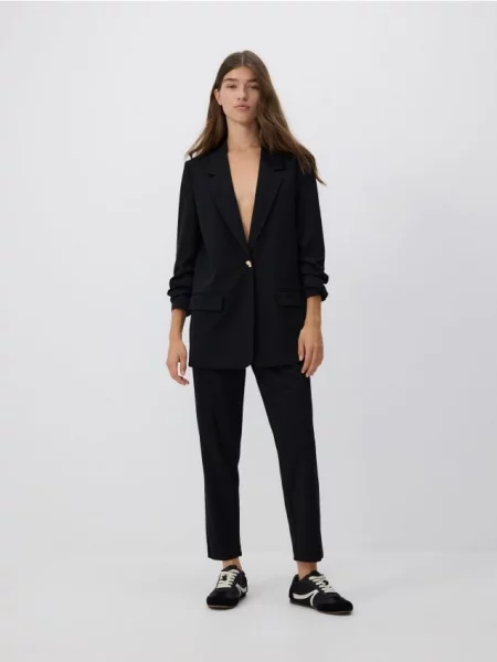 Reserved Штани jogger с защипами чорний