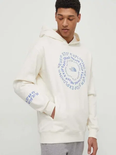 Bombažen pulover The North Face s kapuco bež