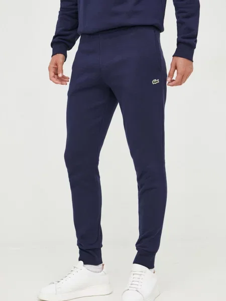 Tepláky Lacoste tmavomodrá hladké hnědé