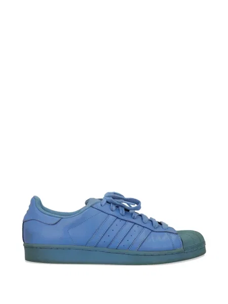 Sneakerși Adidas Pharrell Williams din piele cu dungi albastru