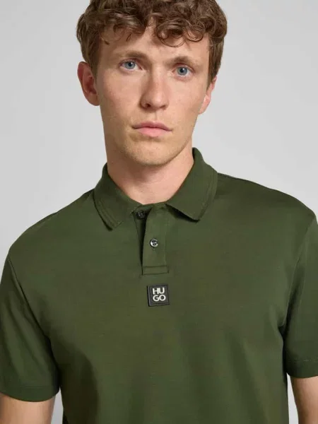 Koszulka polo o kroju regular fit z naszywką logo model ‘Deabono’ Hugo zielone