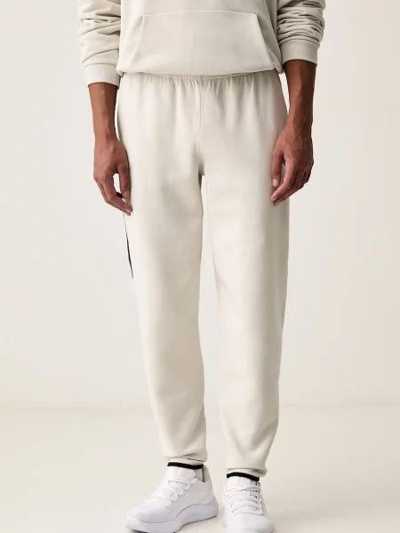 Under Armour pantaloni de trening pentru bărbați Unstoppable bej