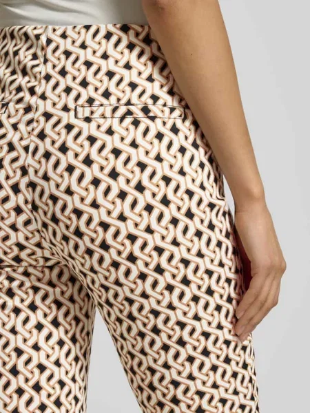 Spodnie o kroju slim fit w skróconym kroju Christian Berg Woman beżowe