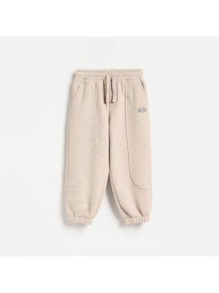 Reserved Jogger nadrág pamuttal bézs