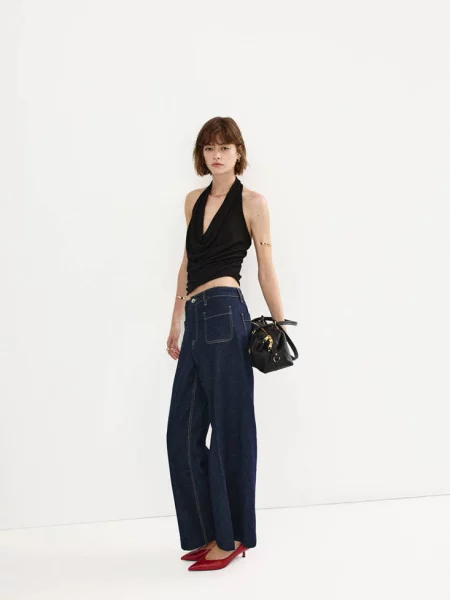 Jeansy wide leg z naszytymi Kobieta 50 MANGO niebieski