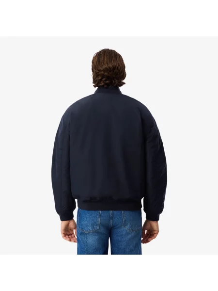 Lacoste Wodoodporna Bomberka Z Tafty niebieski